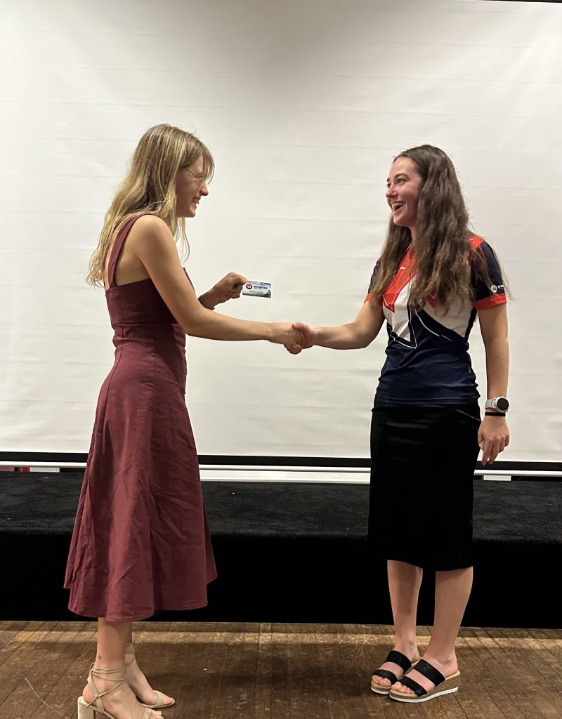 Emily being presented 3rd place in w21 NOL - Orienteering Australia