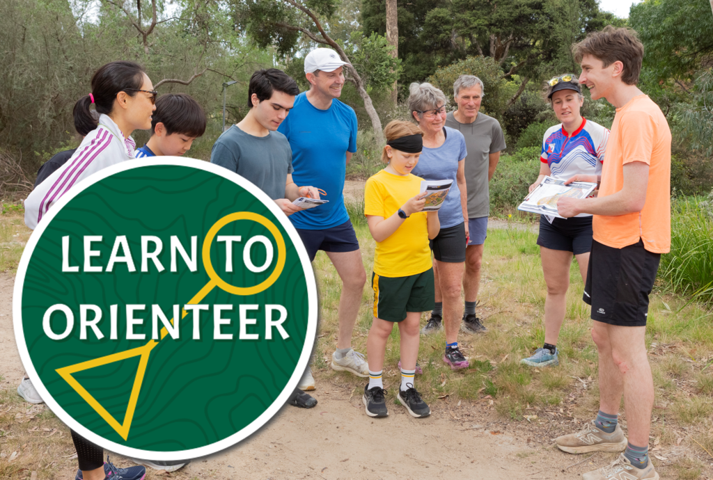 Learn Hero 2 - Orienteering Australia - Orienteering Australia Learn to Orienteer logo in front of a photo of a group of participants looking at a map