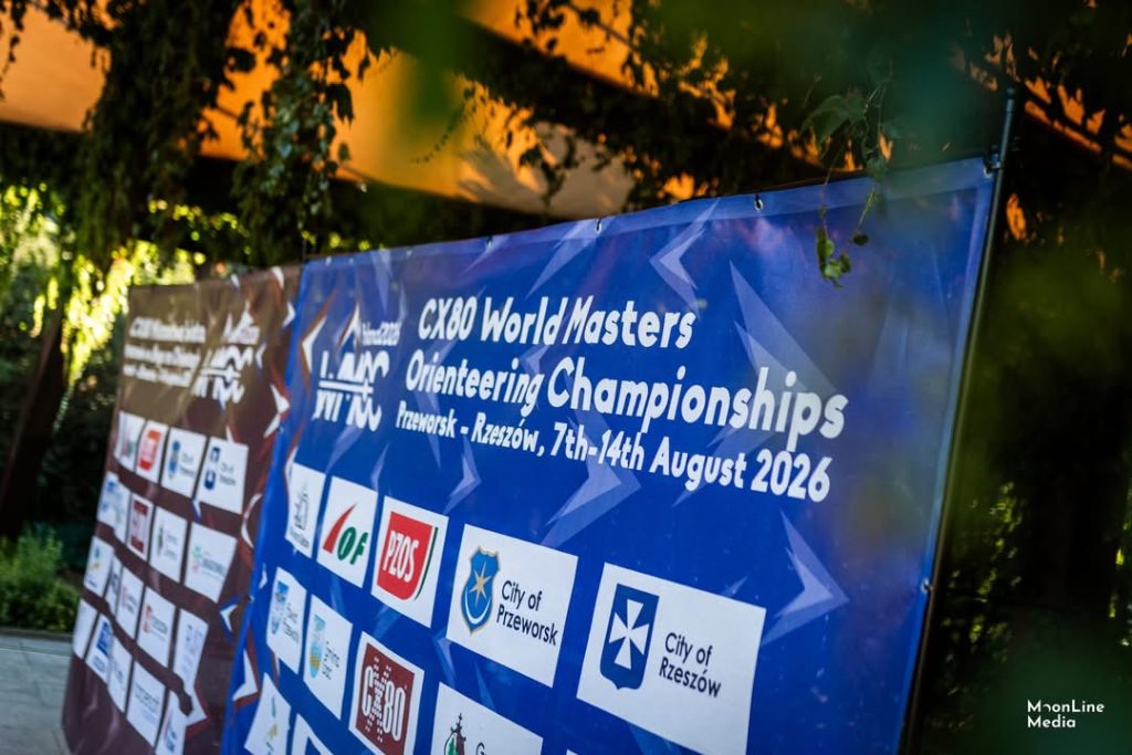 image2 - Orienteering Australia Blue banner advertising the CX80 World Masters Orienteering Championships with dates and sponsor logos.